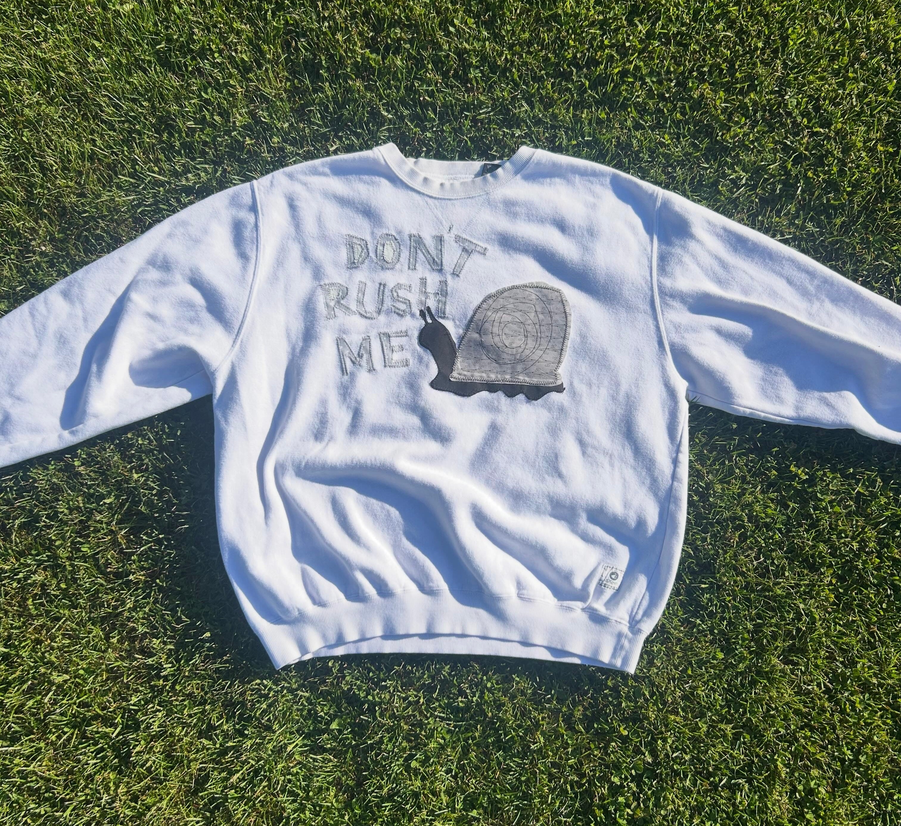 Don’t rush me crewneck 🐌